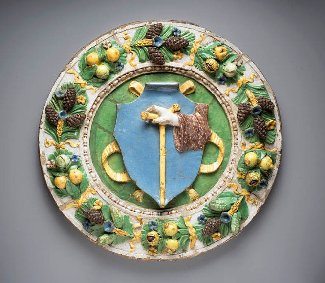 Coat of arms of the Antonite or Vallombrosan Order surrounded by a garland of fruit, flowers, vegetables, and pine cones