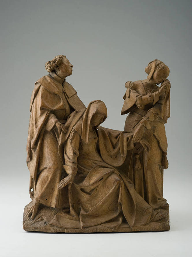 Fragment of a Crucifixion scene from a carved retable of the Passion of Christ: St. John, the Fainting Virgin, and Another Mourner